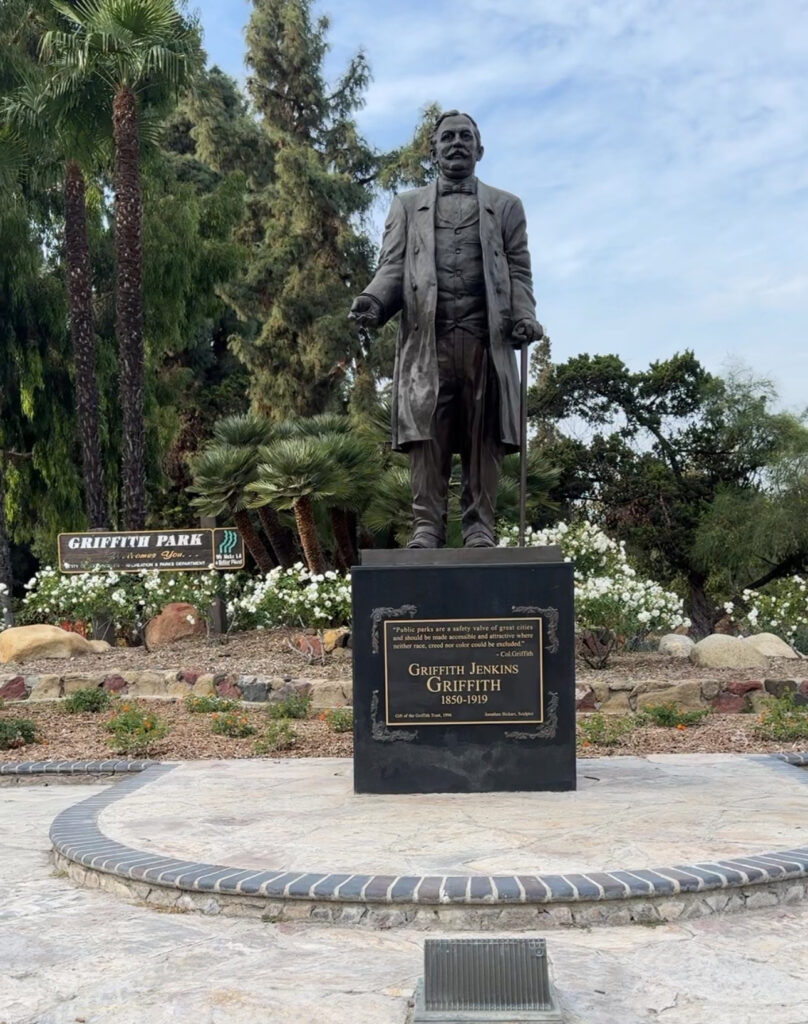 A statue of Griffith J Griffith near the entrance to Griffith Park